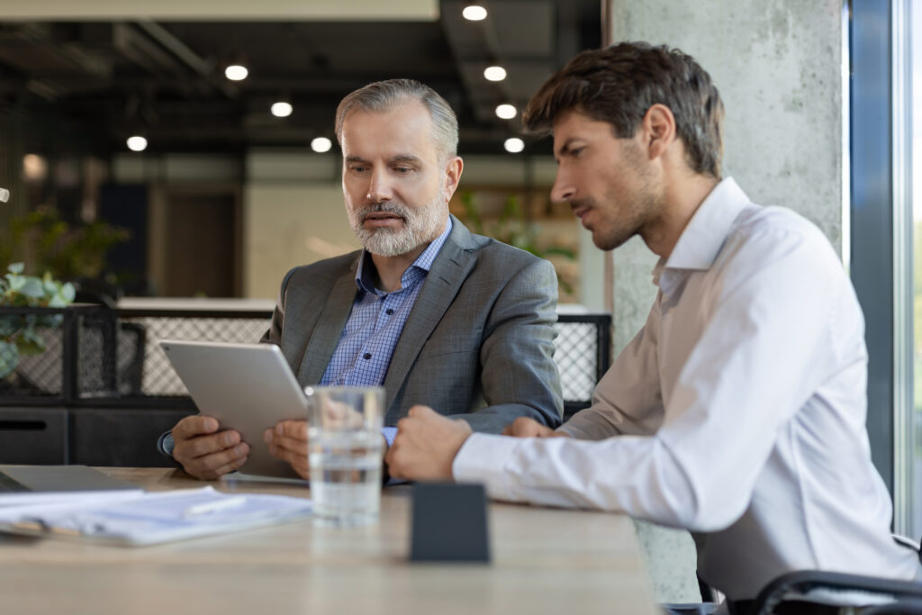 two business men talking each other discussing their business proposal